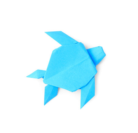 Origami art. Handmade light blue paper turtle on white background, top viewの写真素材