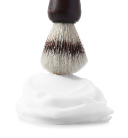 Shaving foam and brush on white backgroundの写真素材