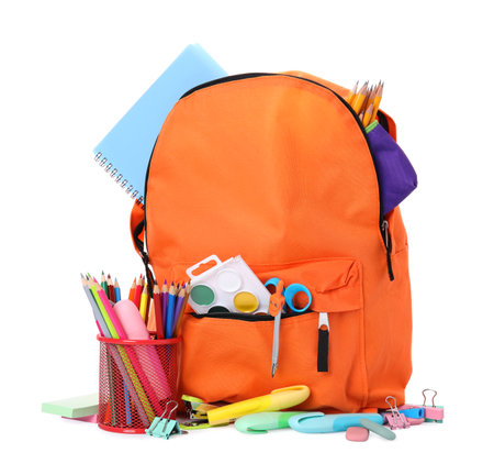 Stylish backpack with school stationery on white backgroundの写真素材