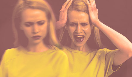 Woman suffering from paranoia on dusty brown background, color toned. Glitch effect