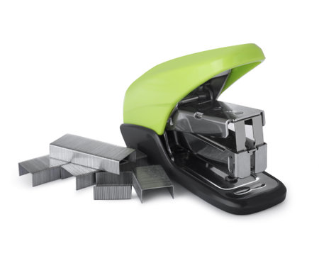 Bright green stapler with staples isolated on white