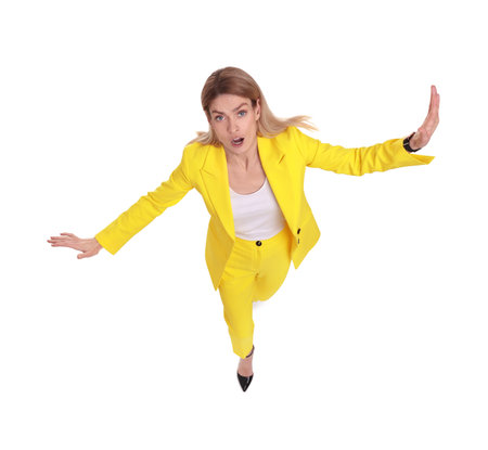 Beautiful emotional businesswoman posing on white background, above viewの写真素材