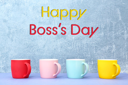 Happy Boss's Day. Greeting card design with many colorful cupsの写真素材