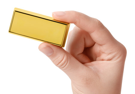 Woman holding gold bar on white background, closeupの写真素材