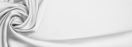 White silk fabric as background, top view. Banner design with space for textの写真素材