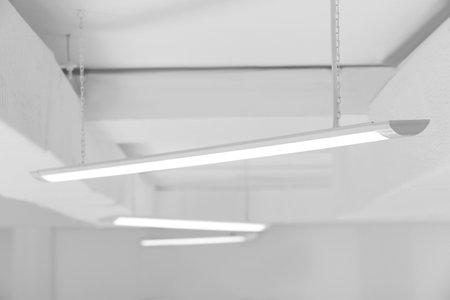 White ceiling with modern lighting in roomの写真素材