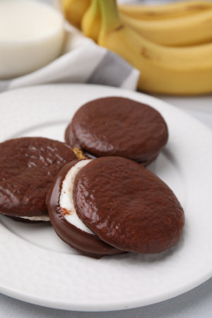 Tasty sweet choco pies on table, closeupの写真素材