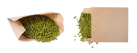 Paper bags with raw mung beans on white backgroundの写真素材