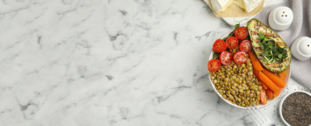 Delicious lentils served on white marble table, flat lay. Banner design with space for textの写真素材