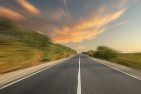 Asphalt country road without transport, motion blur effectの写真素材