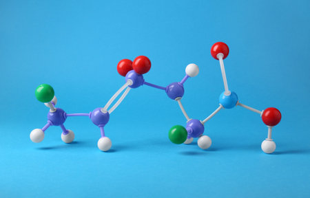 Structure of molecule on light blue background. Chemical modelの写真素材