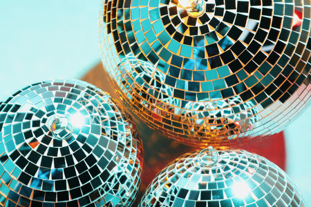 Bright shiny disco balls on color background, above viewの写真素材
