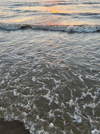 Beautiful view of sea waves at sunset