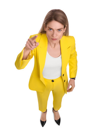 Beautiful businesswoman pointing on white background, above viewの写真素材