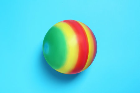 New bright kids' ball on light blue background, top viewの写真素材