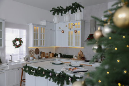 Cozy spacious kitchen decorated for Christmas. Interior designの写真素材