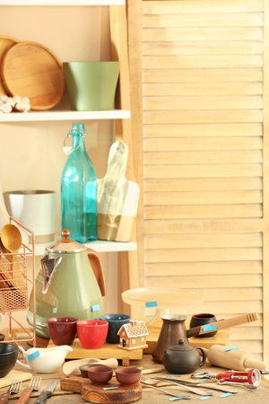 Many different cooking utensils in room. Garage saleの写真素材