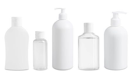 Set of cosmetic bottles with skin care products isolated on whiteの写真素材