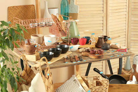 Many different cooking utensils in room. Garage saleの写真素材