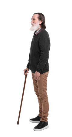 Senior man with walking cane on white backgroundの写真素材