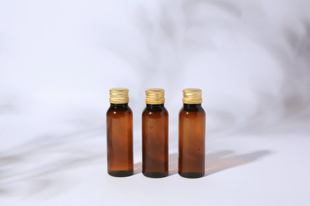 Bottles of cosmetic products on white backgroundの写真素材