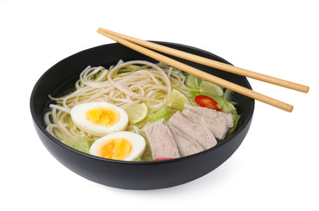 Bowl of delicious rice noodle soup with meat and egg isolated on white