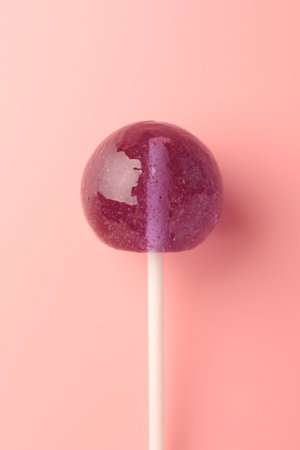 Tasty lollipop on pink background, top viewの写真素材