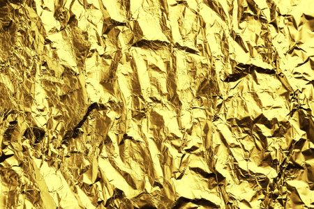 Closeup view of shiny golden surface as backgroundの写真素材