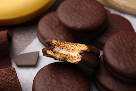 Tasty banana choco pies on table, closeupの写真素材