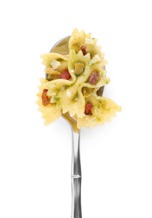 Spoon with tasty pasta isolated on white, top viewの写真素材