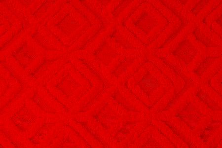 Soft red carpet with pattern as background, top viewの写真素材