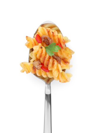 Spoon with tasty pasta isolated on white, top viewの写真素材