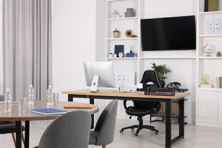 Stylish office with comfortable furniture and tv zone. Interior designの写真素材