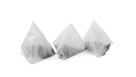 Three new tea bags on white backgroundの写真素材