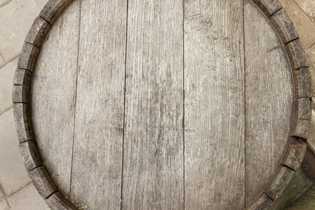 Traditional wooden barrel outdoors, top view. Wine makingの写真素材