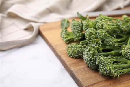 Fresh raw broccolini on white table, closeup and space for text. Healthy foodの写真素材