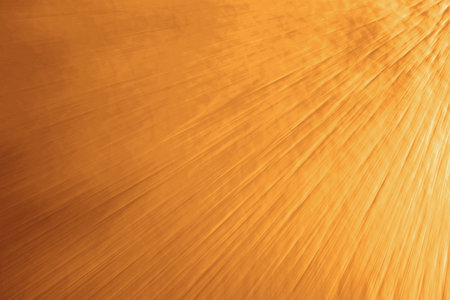 Golden textured surface as background, closeup viewの写真素材