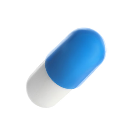 One pill isolated on white. Medical treatmentの写真素材