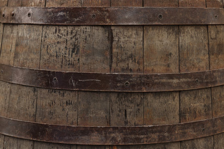 Traditional wooden barrel as background, closeup. Wine makingの写真素材