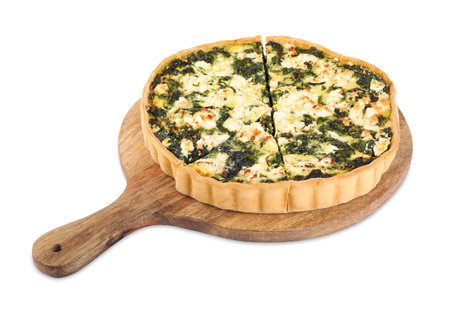 Delicious homemade spinach quiche isolated on whiteの写真素材