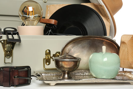 Many different stuff on white background. Garage sale