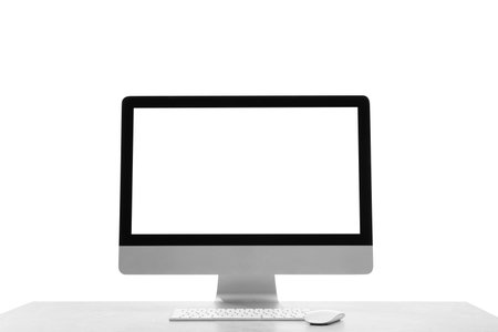 New computer with blank monitor screen, keyboard and mouse on white backgroundの写真素材