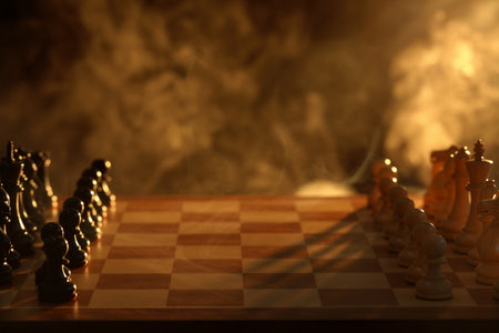 Black and white chess pieces on checkerboard before game. Space for textの写真素材