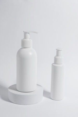 Bottles with cosmetic products on white backgroundの写真素材