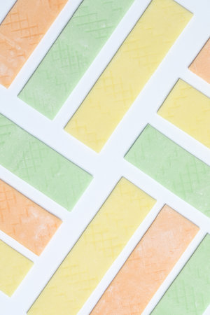 Sticks of tasty bubble gums on white background, flat layの写真素材