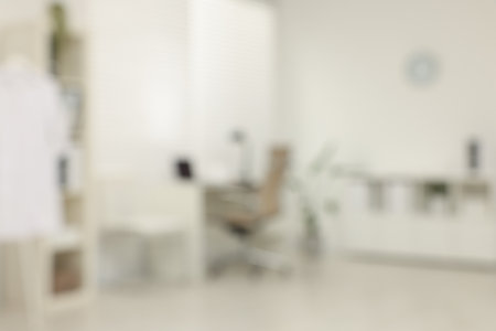 Blurred view of modern medical office with doctor's workplace in clinicの写真素材