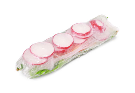 Tasty spring roll wrapped in rice paper isolated on white