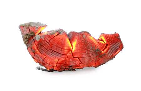 Piece of smoldering coal isolated on whiteの写真素材