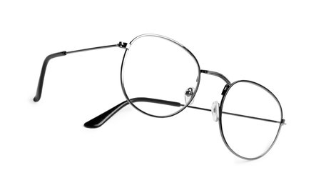 Stylish pair of glasses isolated on whiteの写真素材