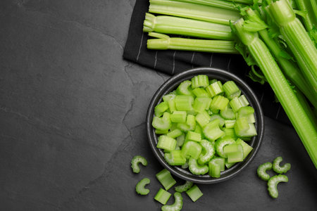Fresh ripe celery on gray table, flat lay. Space for textの写真素材